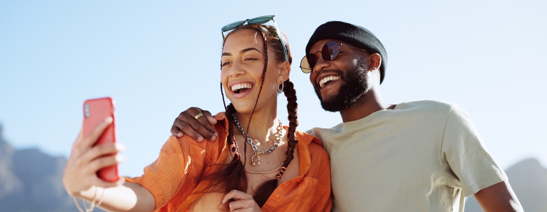 a man and woman smiling