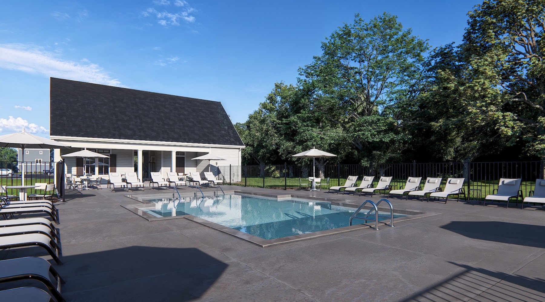 a courtyard with a pool and chairs