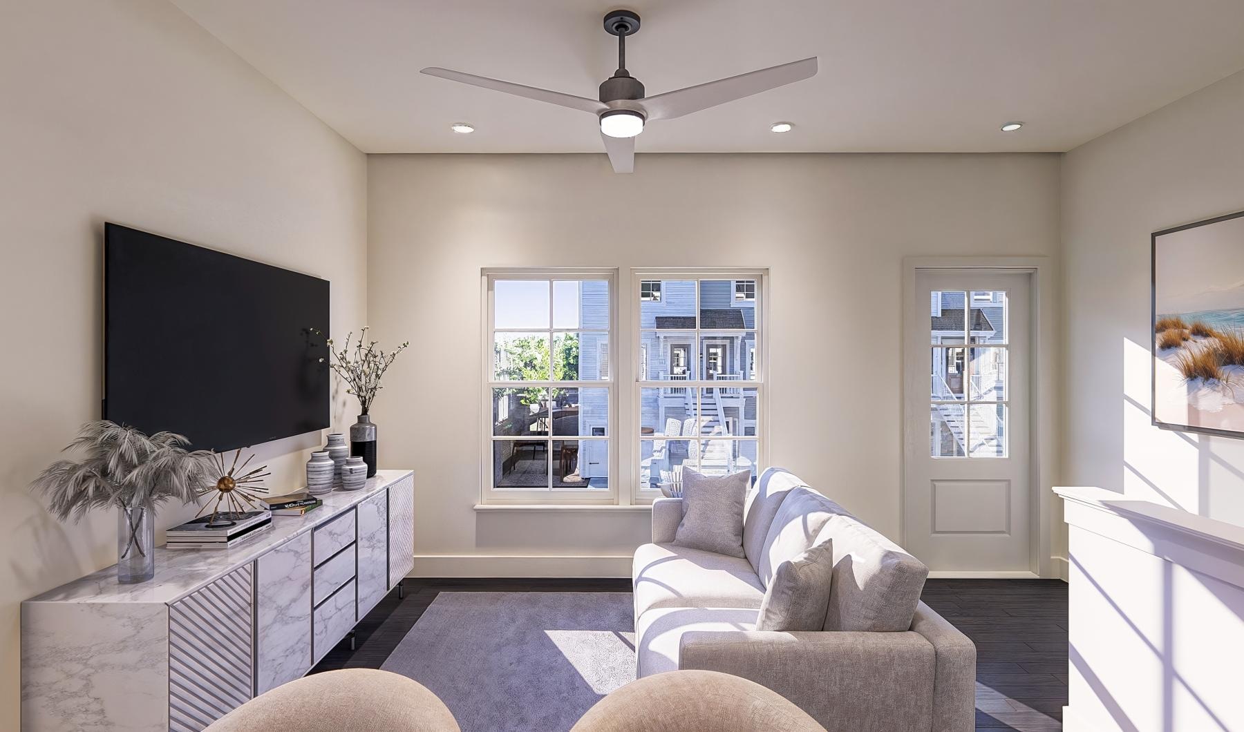 a living room with a couch and a tv